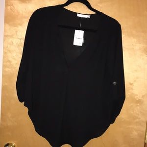 Sheer quarter sleeve v-neck top